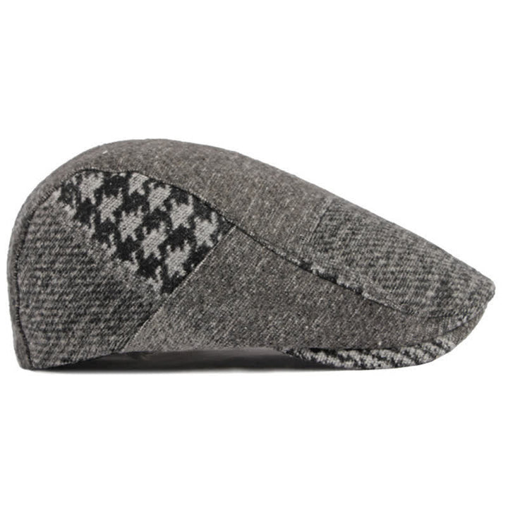 Baskenmütze aus Tweed mit Patchwork-Nähten und Fischgrätenmuster