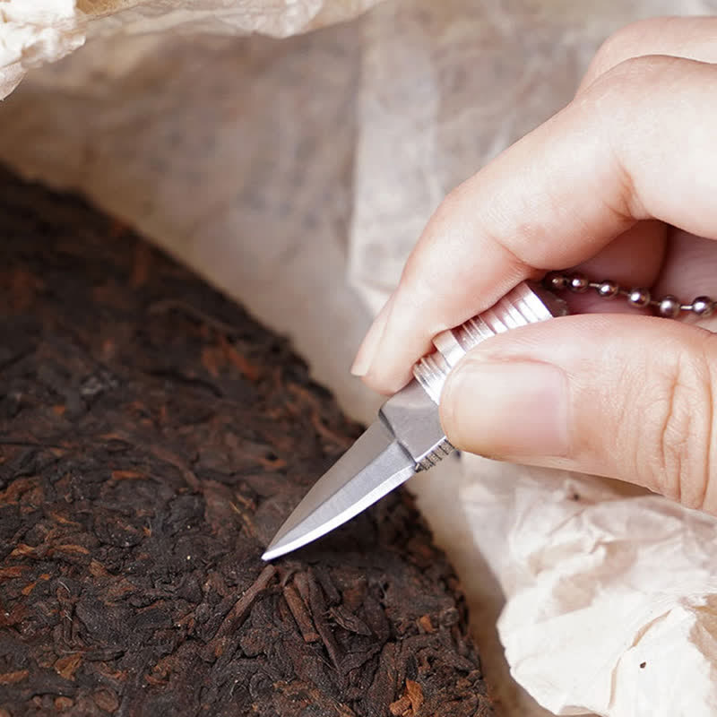 Goldene Farbe Lampe Birne Form versteckte Messer Schlüsselanhänger