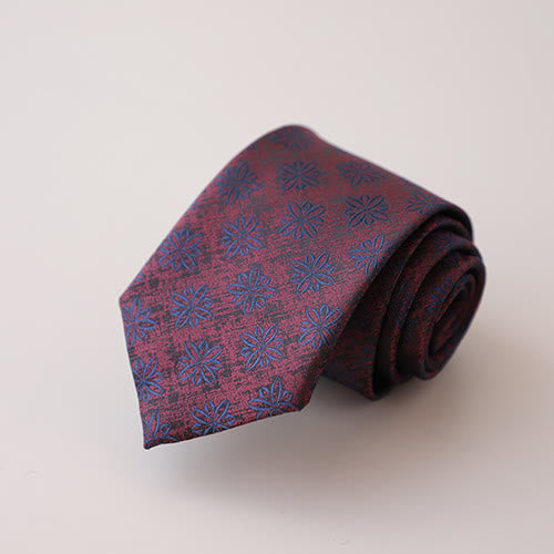 Herren Krawatte mit lila-grünem Blumenmuster