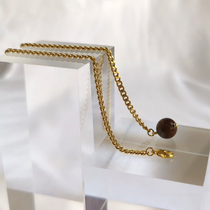 Herren-Anzugbrosche mit 18 Karat vergoldetem Naturstein und hängender Kette