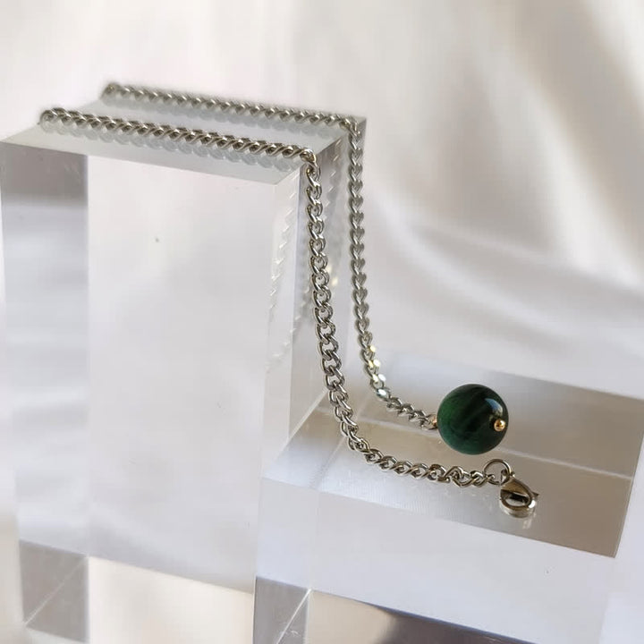 Herren-Anzugbrosche mit 18 Karat vergoldetem Naturstein und hängender Kette