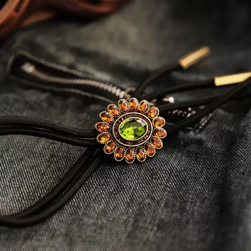 Bolokrawatte mit Blumenmotiv in Solarorange und Grün