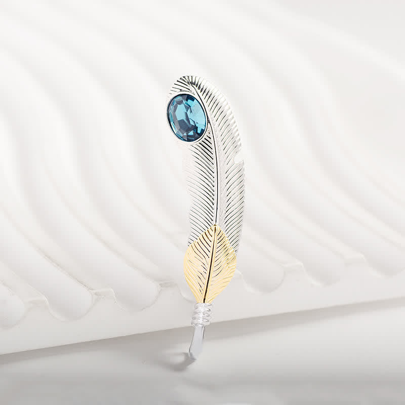 Unisex-Brosche in Federform mit Kunstkristall in Blau
