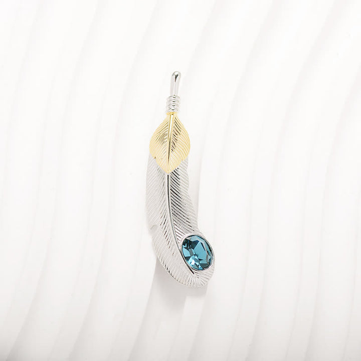 Unisex-Brosche in Federform mit Kunstkristall in Blau