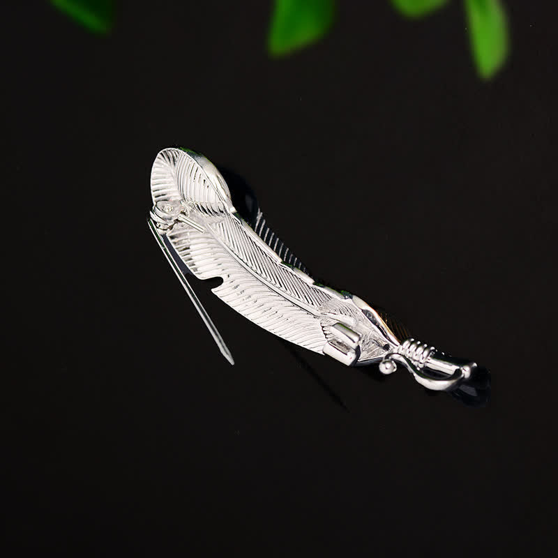 Unisex-Brosche in Federform mit Kunstkristall in Blau