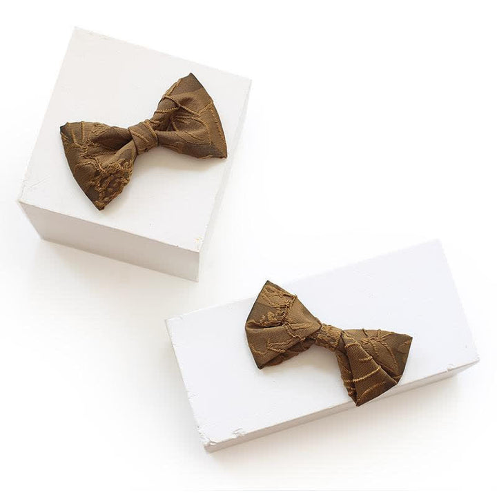 Dunkelkaffeefarbene Jacquard-Fliege mit Blumenmuster für Herren