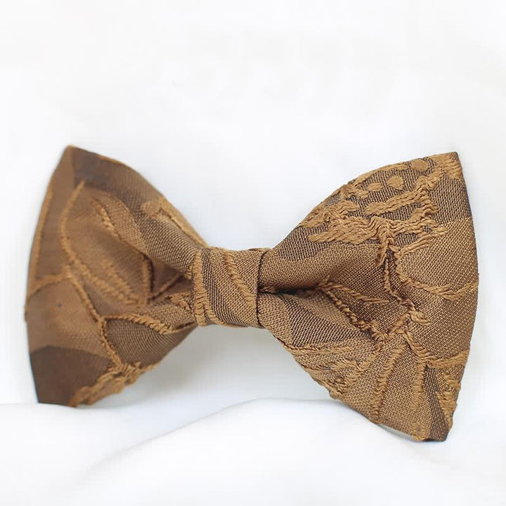 Dunkelkaffeefarbene Jacquard-Fliege mit Blumenmuster für Herren