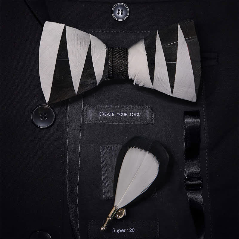 Weiße und schwarze Federfliege mit Anstecknadel