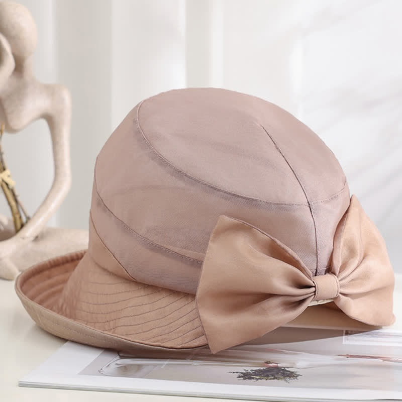Faltbarer Sonnenhut aus Seide mit großer Schleife und breiter Krempe für Damen