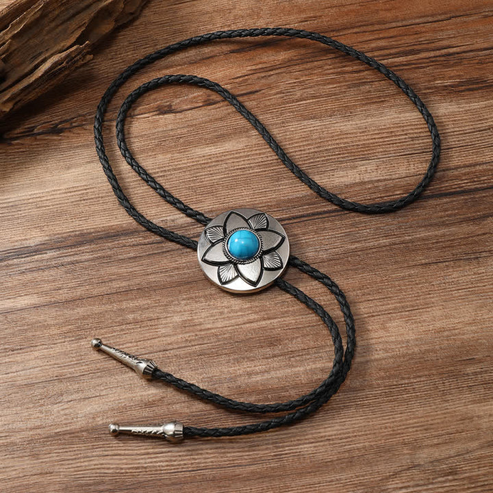 Oval geschnitzte Blütenblatt Schwarzer Türkis Stein Bolo-Tie