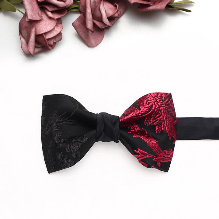 Fliege für Herren mit schwarzem und rotem Weinranken-Blumenmuster