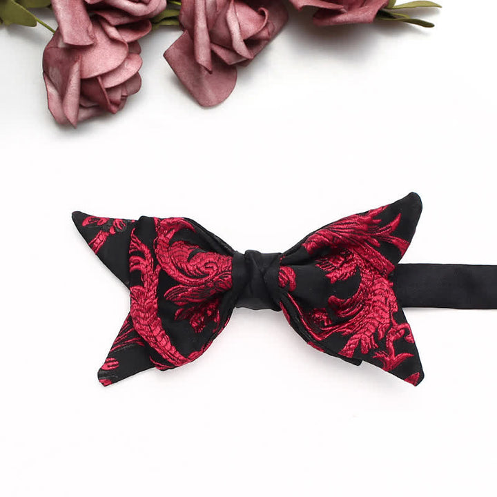 Fliege für Herren mit schwarzem und rotem Weinranken-Blumenmuster