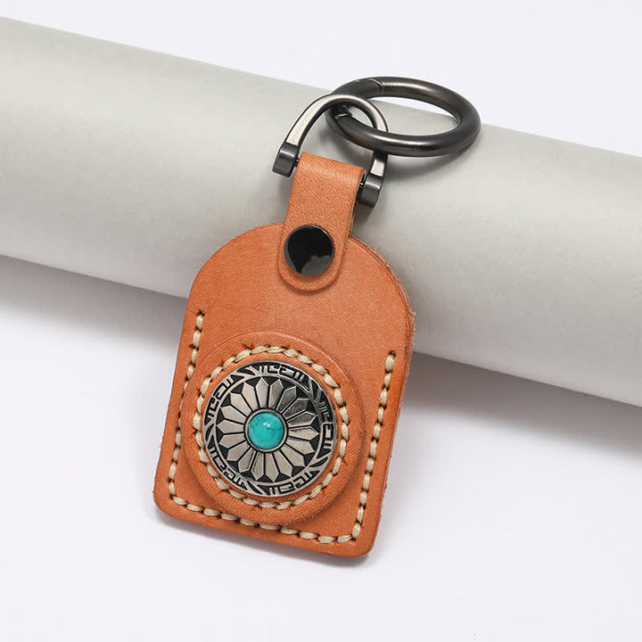 Charmanter Boho-Blumen-Schlüsselanhänger aus türkisem Leder