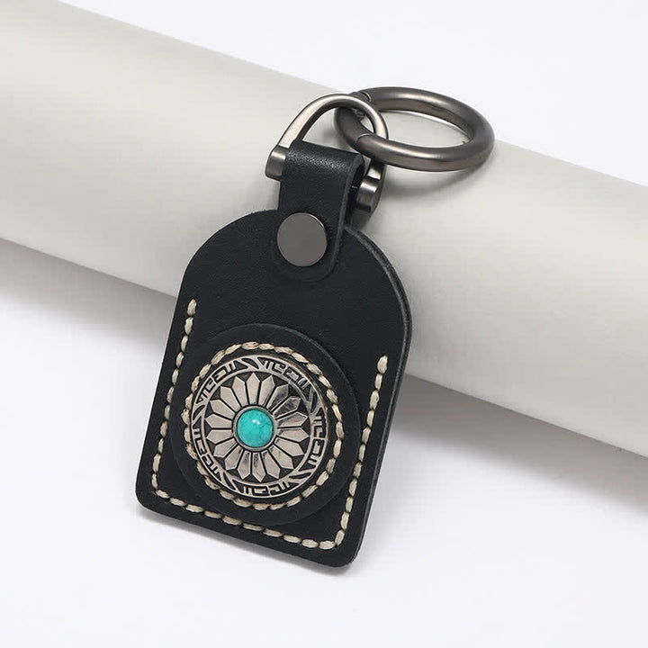 Charmanter Boho-Blumen-Schlüsselanhänger aus türkisem Leder