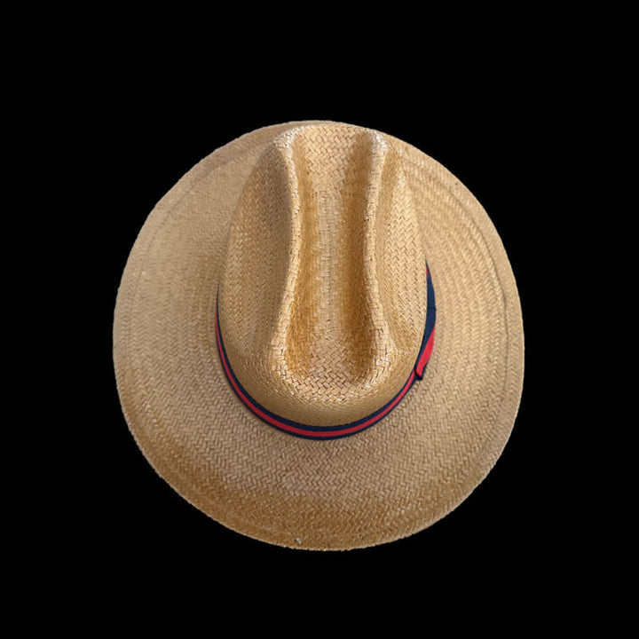 Dekorativer roter und marineblauer Cowboystrohhut mit Band