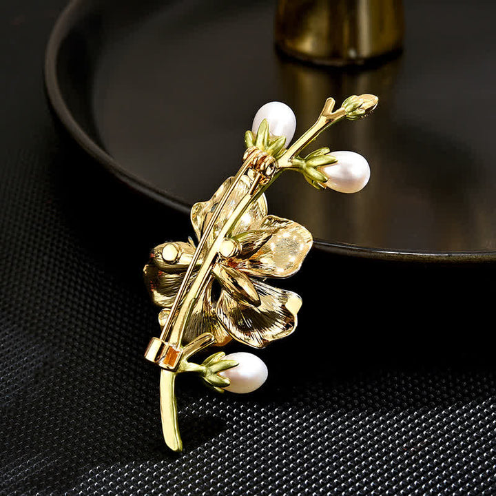 Brosche aus blauer Emaille mit Magnolienblume und unechter Perle für Damen
