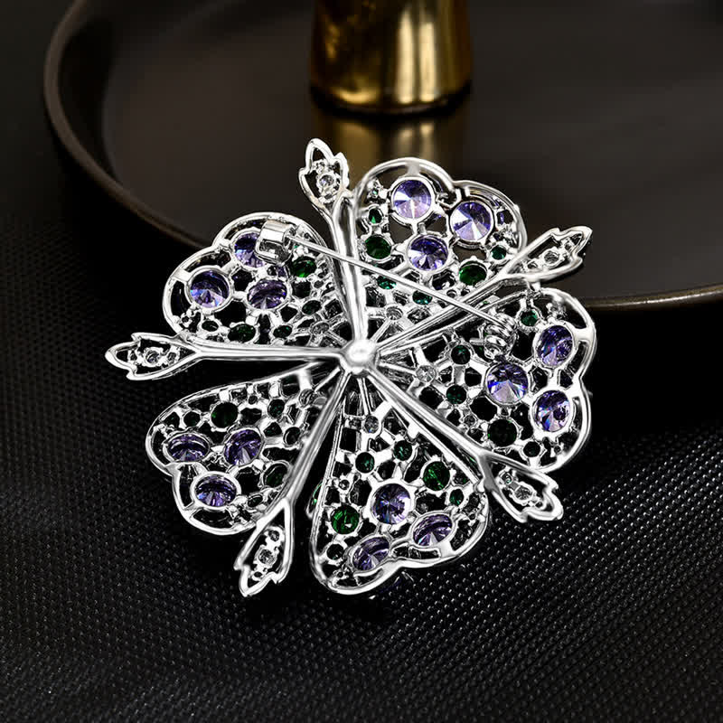 Elegante florale Brosche mit farbigen Zirkoniaperlen für Damen