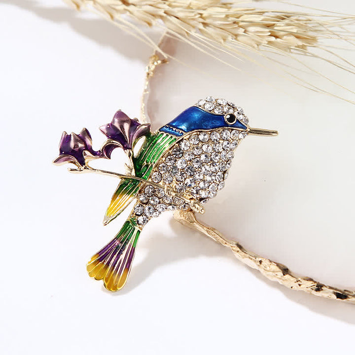 Damen-Brosche mit Emaille-Motiv „Elster“ und Rosenvogel und Strasssteinen