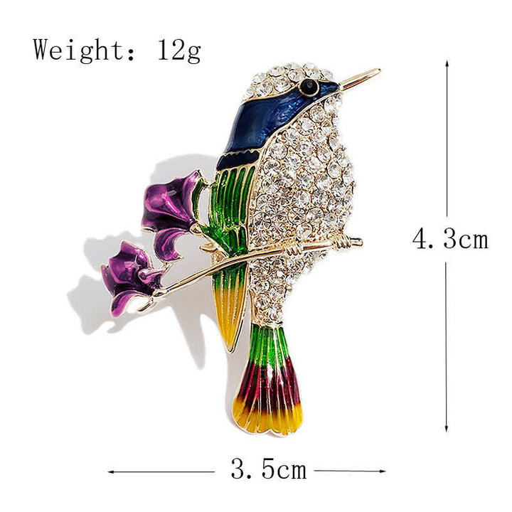 Damen-Brosche mit Emaille-Motiv „Elster“ und Rosenvogel und Strasssteinen