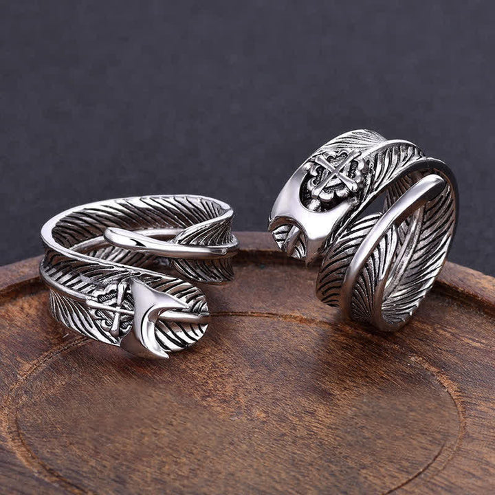 Verstellbarer Ring mit Federkreuz und versteckter Klinge