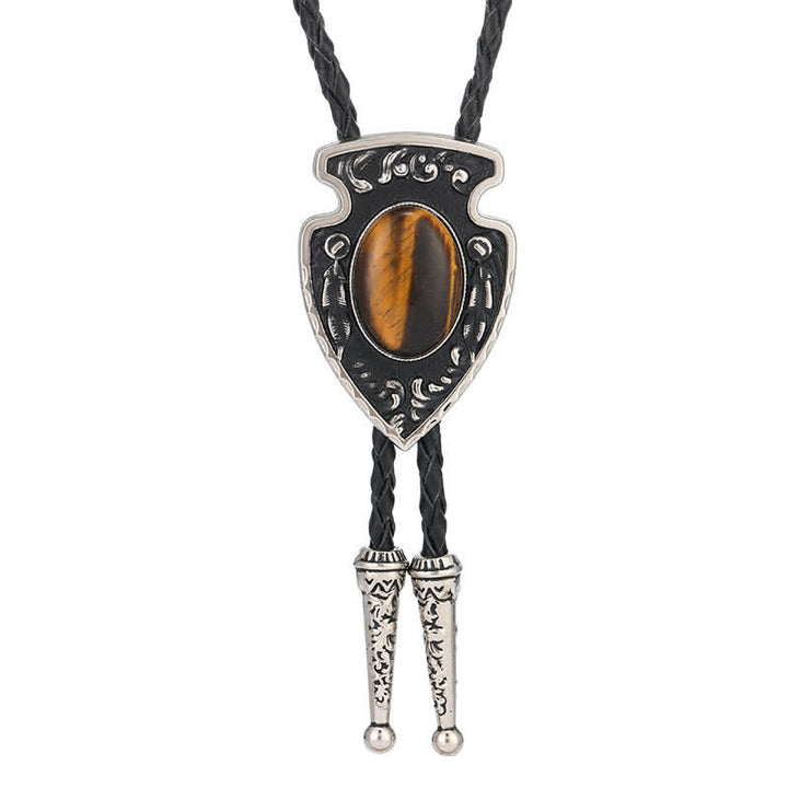 Bolotie mit Anhänger aus Kunststein im Tribal-Stil mit Pfeilen