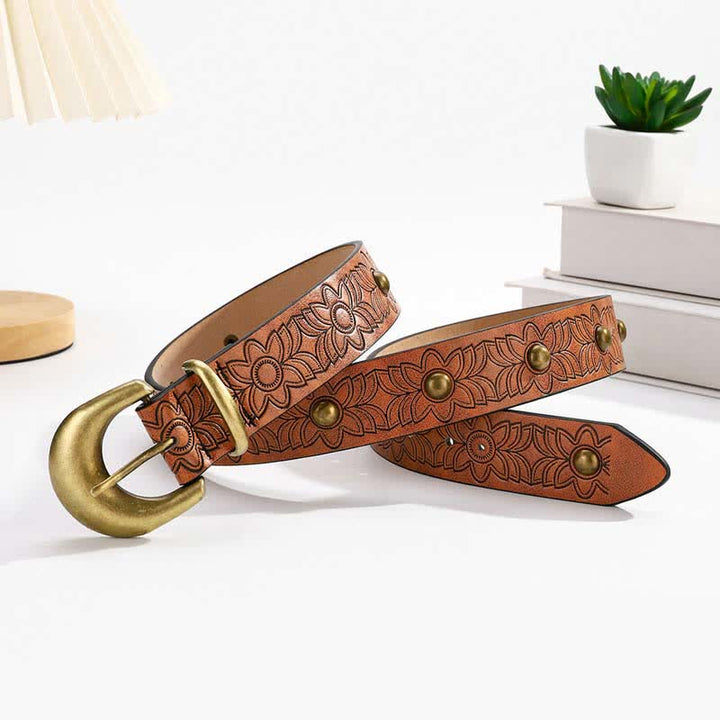 Eleganter Ledergürtel mit Blumendruck und bronzefarbenen Nieten