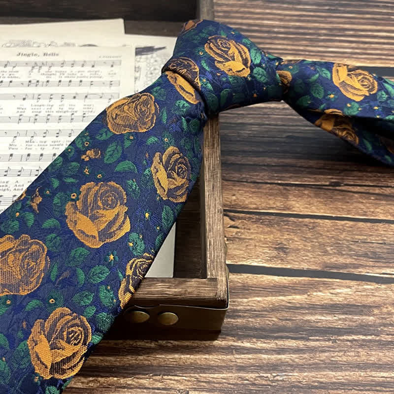 Fliege für Herren mit Blumenmuster in Marineblau und Orange mit Rosenmuster