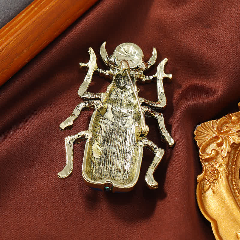 Antike große Emaille-Brosche mit Skarabäus-farbigem Kristall