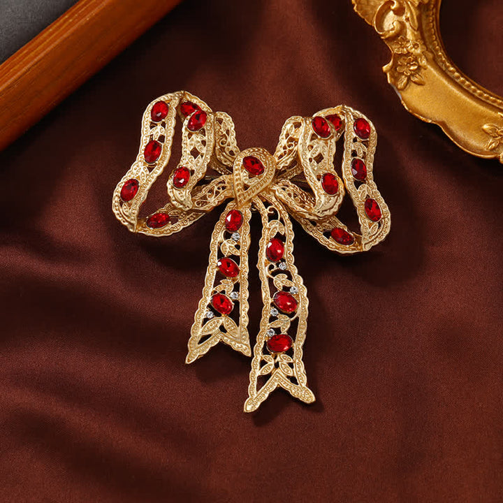 Ausgefallene Brosche mit Schleife und Knoten aus gewelltem Metallband für Damen in Gold