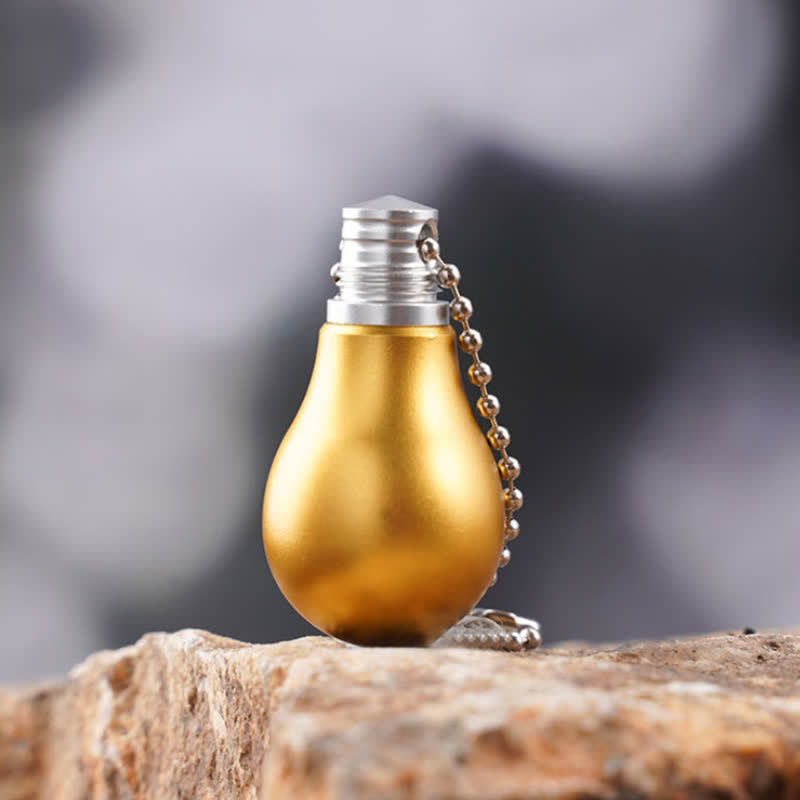 Goldene Farbe Lampe Birne Form versteckte Messer Schlüsselanhänger