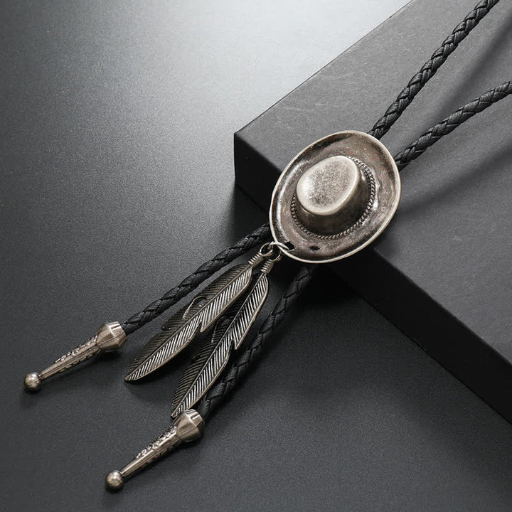 Rodeo Cowboy-Hut mit Feder-Bolo-Tie