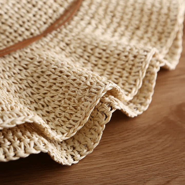 Eleganter, faltbarer Strohhut für den Sommer mit breiter Krempe für Damen