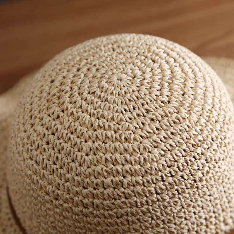 Eleganter, faltbarer Strohhut für den Sommer mit breiter Krempe für Damen