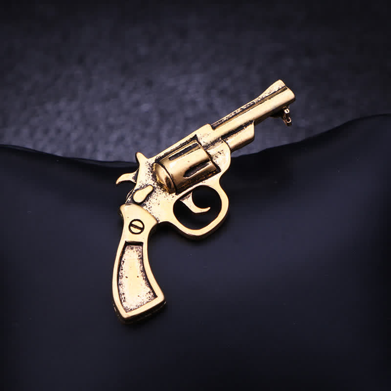 Mini-Vintage-Brosche in dominanter Pistolenform für Herren