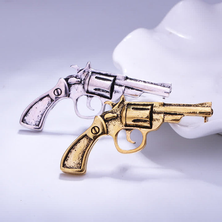 Mini-Vintage-Brosche in dominanter Pistolenform für Herren