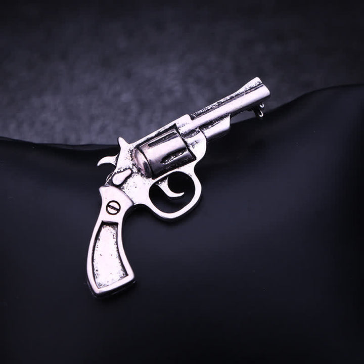 Mini-Vintage-Brosche in dominanter Pistolenform für Herren