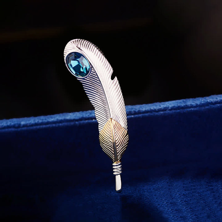 Unisex-Brosche in Federform mit Kunstkristall in Blau