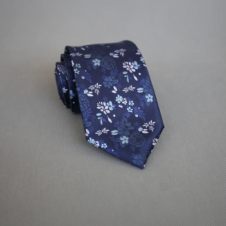Herren-Krawatte aus Polyester mit dunklem Hintergrund und bunten Blumen