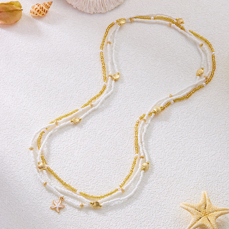 Damen Boho Strand Mehrschichtige Seestern Muschel Perlen Taillenkette