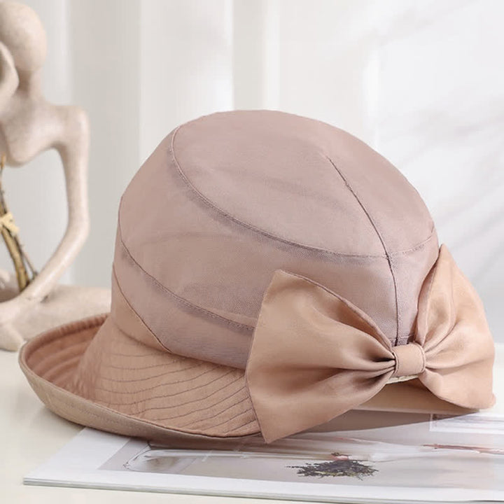 Faltbarer Sonnenhut aus Seide mit großer Schleife und breiter Krempe für Damen