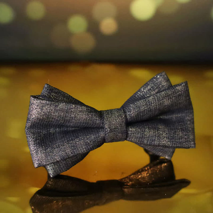 Schwarze Fliege für Herren mit dezenten goldenen glitzernden Details