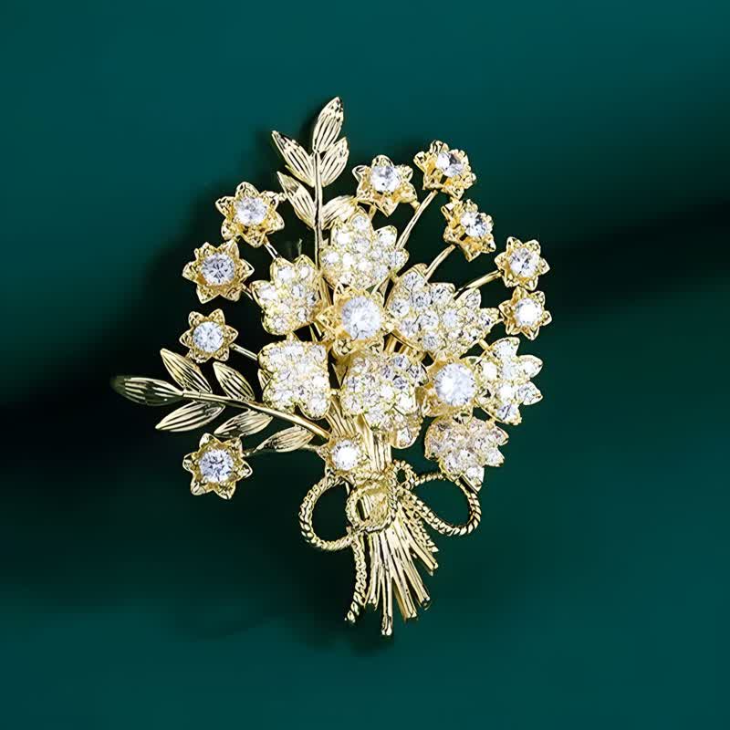 Damen-Brosche mit goldenen Strasssteinen und Blumenstrauß