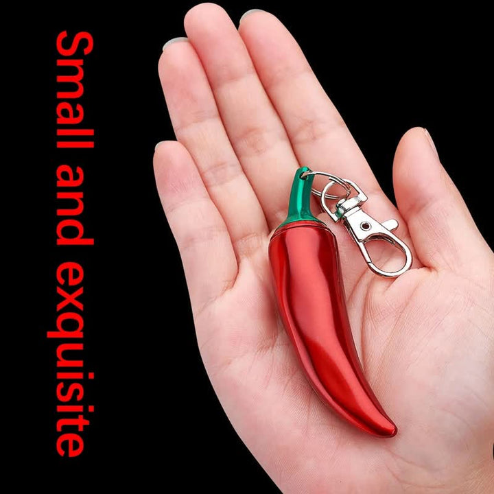 Neuartiges Kerosinfeuerzeug in Chili-Form mit permanentem Streichholz als Schlüsselanhänger