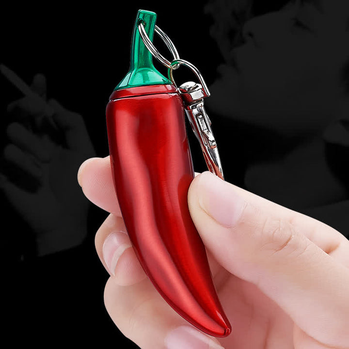 Neuartiges Kerosinfeuerzeug in Chili-Form mit permanentem Streichholz als Schlüsselanhänger
