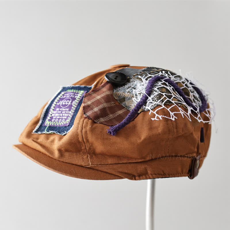 Karamellfarbene Baskenmütze im Streetstyle aus Stoff mit Patchwork-Knopf