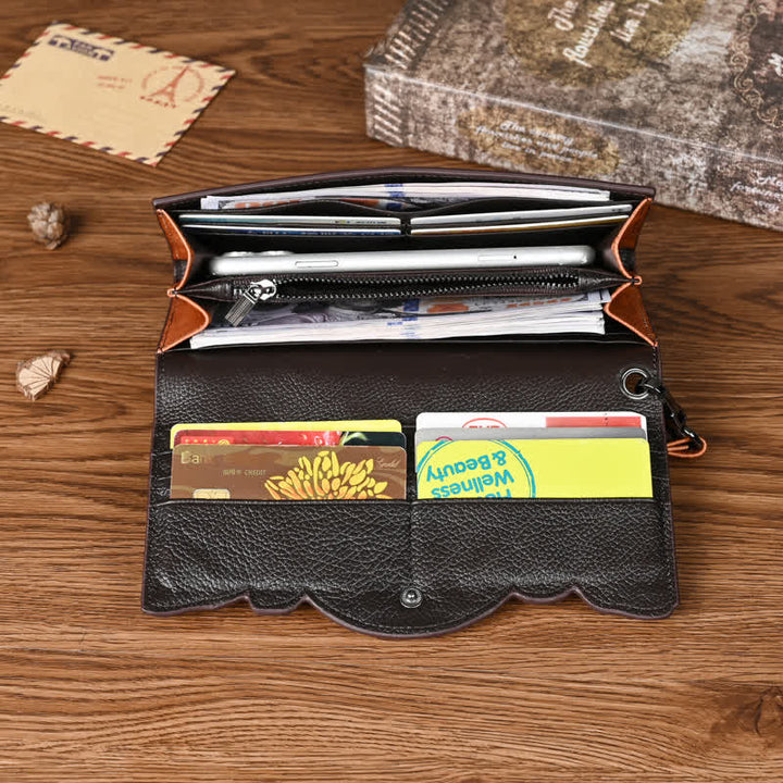 Lange, dreifach gefaltete Lederbrieftasche für Damen mit Blumenmuster und Handschlaufe