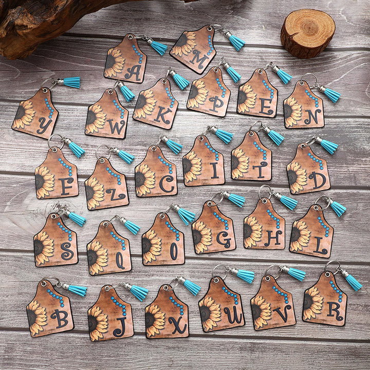 Western-Stil Sonnenblumen & Buchstaben Quaste Leder Schlüsselanhänger - image 1