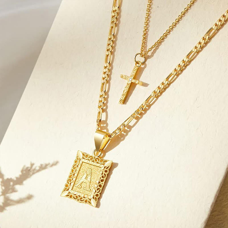 Goldene quadratische Buchstaben- und Kreuz-Halskette mit Doppelkette - image 0