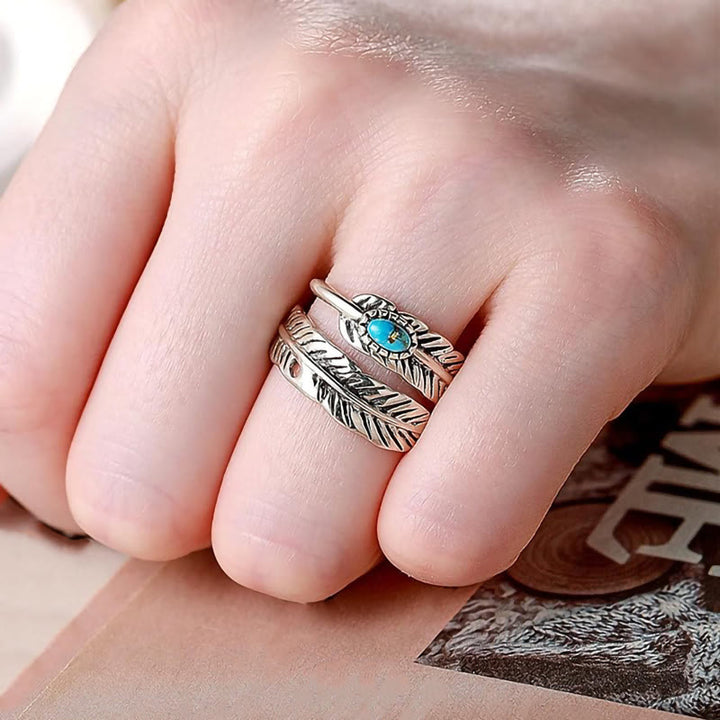 Silberner Ring mit eingelegter türkisfarbener Feder im Bohème-Stil - image 1