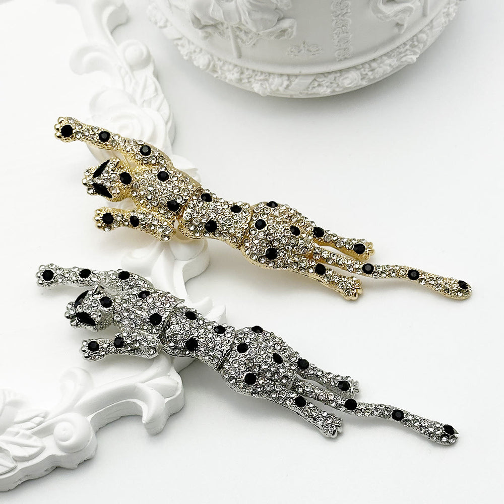 Bewegliche Brosche mit Gepardenmotiv und Diamantbesatz in Schwarz - image 1